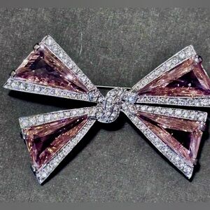 Nolan Miller 80’s Vintage Bow large pink crystals in silver tone 3”x2”